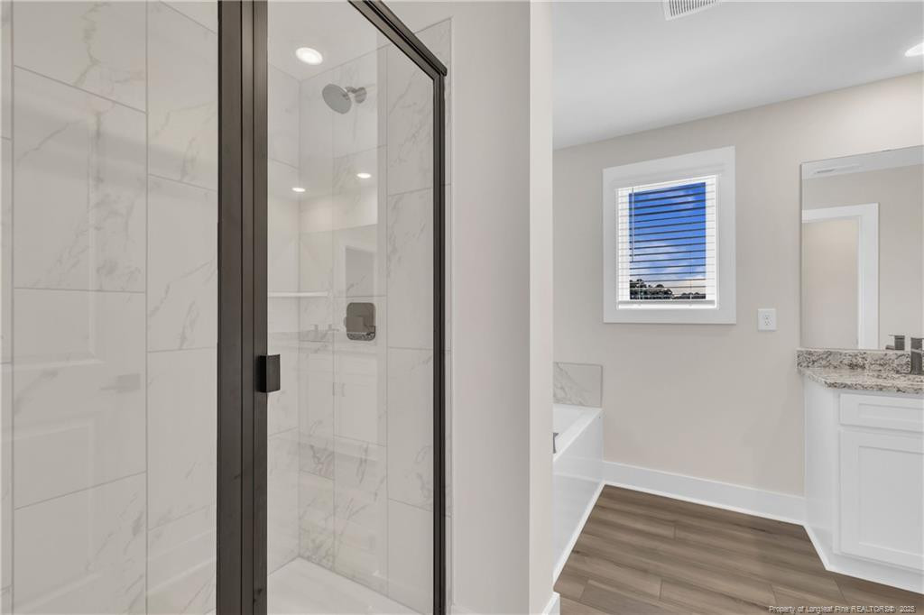 136 Camp Rock Road Lillington, NC 27546 - Photo 28 of 43 a bathroom with a shower and a sink