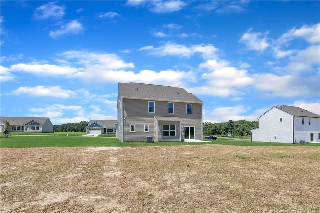136 Camp Rock Road Lillington, NC 27546 - Photo 41 of 43 a front view of a house with a yard