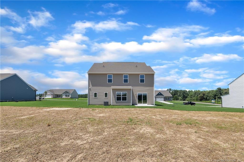 136 Camp Rock Road Lillington, NC 27546 - Photo 42 of 43 a front view of a house with a yard