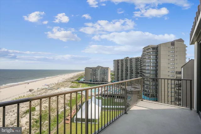 a view of a building next to a yard