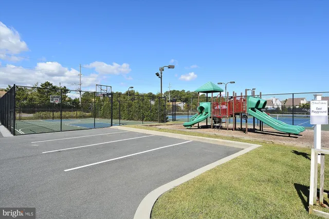 a view of an outdoor space and tennis court