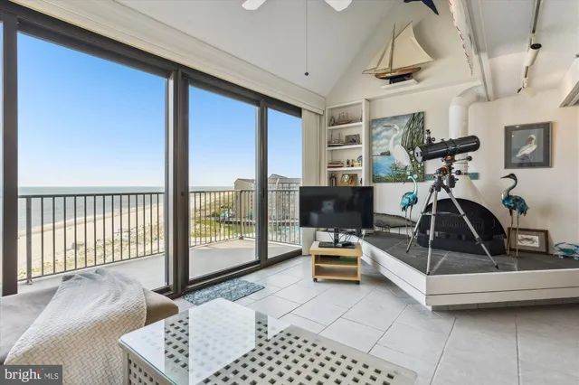 a bedroom with furniture and a chandelier