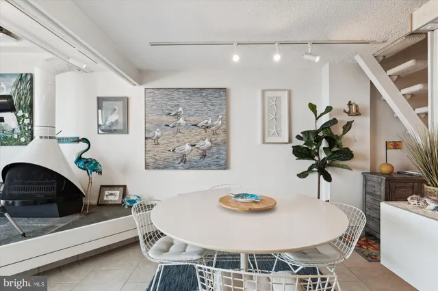 a kitchen with a white cabinets and white appliances