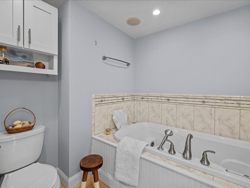 26 Wompatuck Road Hingham, MA 02043 - Photo 13 of 24 a bathroom with a toilet and a sink