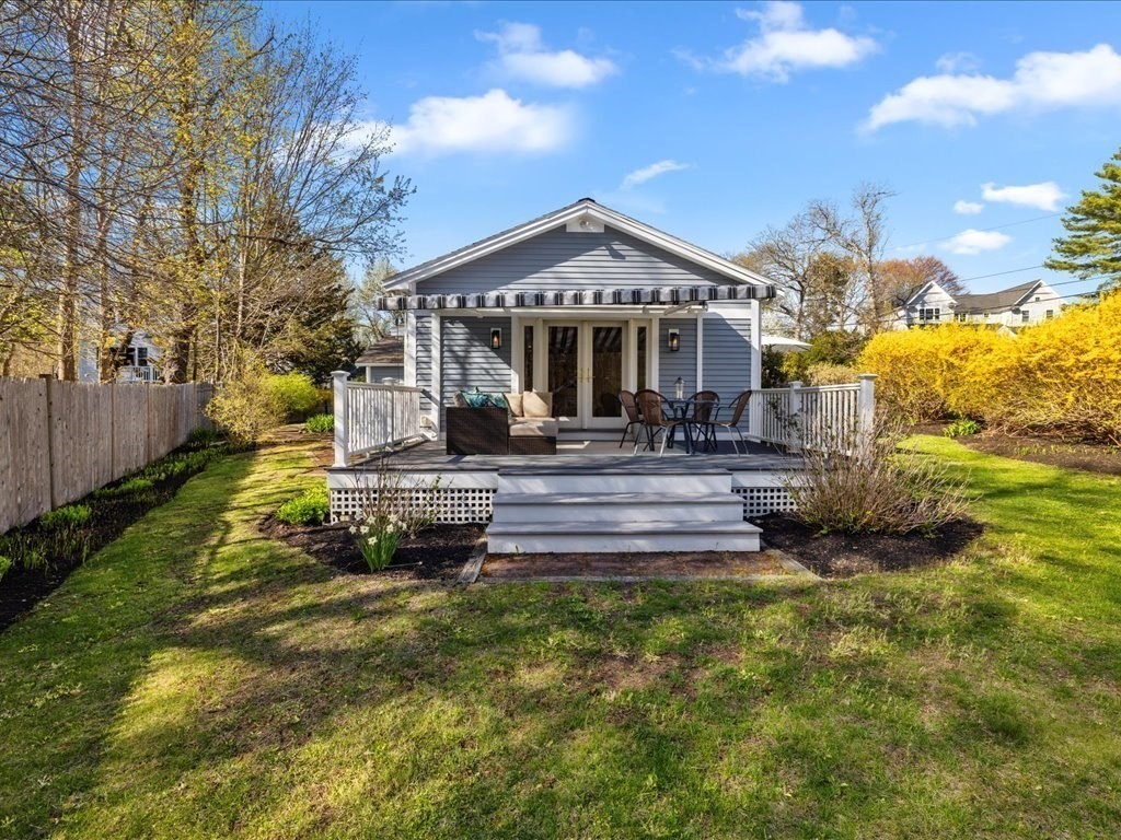 26 Wompatuck Road Hingham, MA 02043 - Photo 17 of 24 a front view of a house with a yard