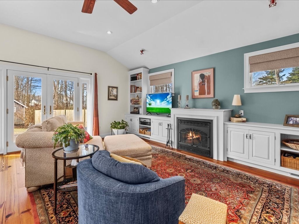 26 Wompatuck Road Hingham, MA 02043 - Photo 2 of 24 a living room with furniture and a fireplace