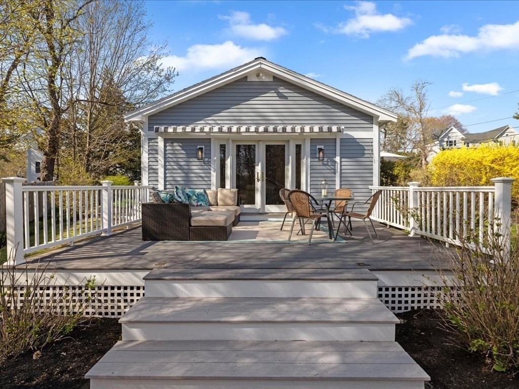 26 Wompatuck Road Hingham, MA 02043 - Photo 23 of 24 a view of a house with a porch and furniture