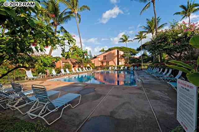 3959 Lower Honoapiilani Road, Unit 305 Lahaina, HI 96761 - Photo 12 of 16 a view of a chairs and table in the patio