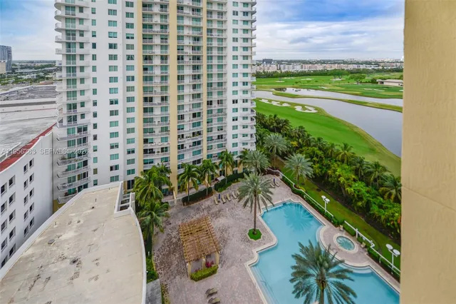 a view of swimming pool from a balcony