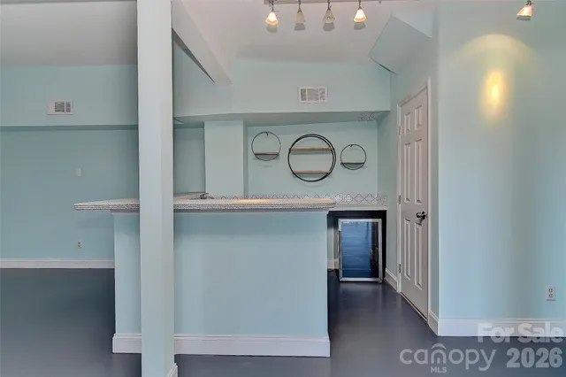 a view of a hallway with entryway