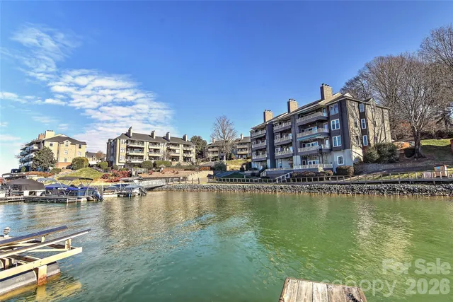 a view of a lake with building in front of it