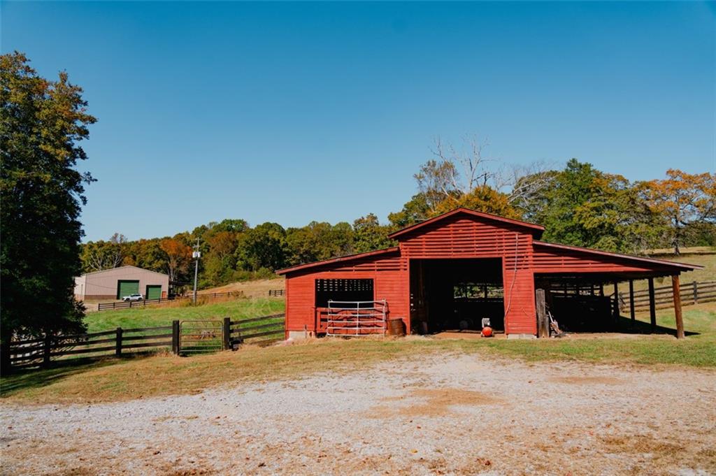 1955 Alec Mountain Road Clarkesville, GA 30523 - Photo 106 of 110 a front view of a house with a yard and garage