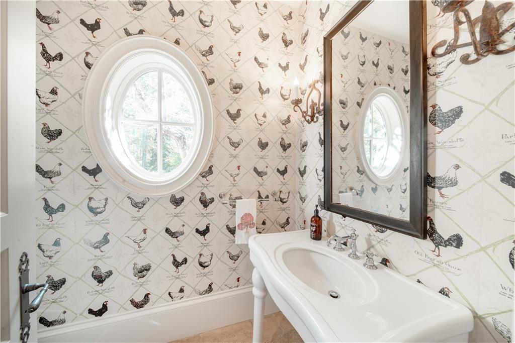 1955 Alec Mountain Road Clarkesville, GA 30523 - Photo 27 of 110 a bathroom with a sink and a mirror