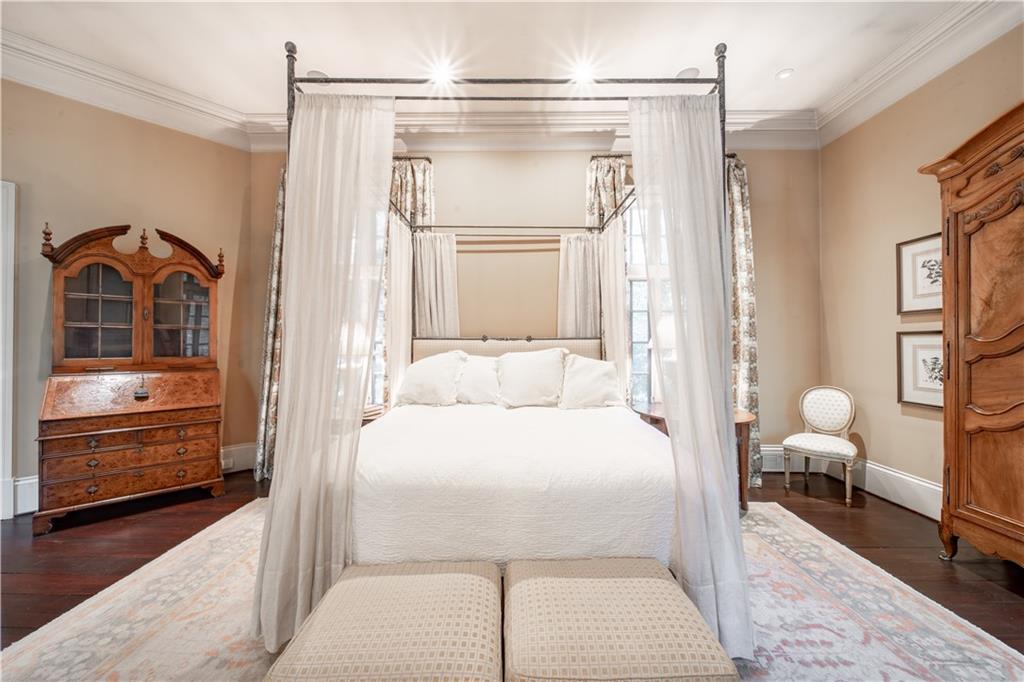 1955 Alec Mountain Road Clarkesville, GA 30523 - Photo 32 of 110 a bedroom with a bed and a dresser with rug