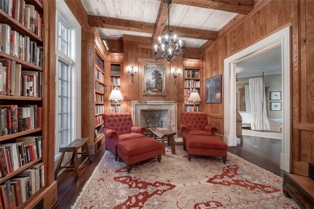 1955 Alec Mountain Road Clarkesville, GA 30523 - Photo 40 of 110 a living room with furniture and a book shelf