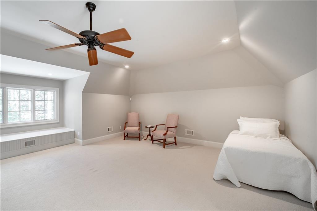 1955 Alec Mountain Road Clarkesville, GA 30523 - Photo 56 of 110 a living room with furniture and a chandelier