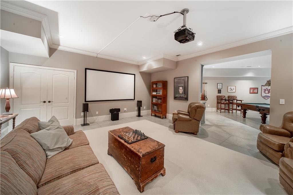 1955 Alec Mountain Road Clarkesville, GA 30523 - Photo 64 of 110 a living room with furniture and a flat screen tv