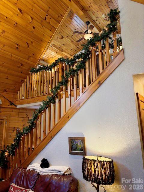 399 Bent Tree Road Maggie Valley, NC 28751 - Photo 15 of 48 a view of staircase with lots of frames on wall