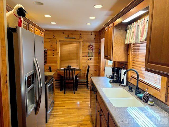 399 Bent Tree Road Maggie Valley, NC 28751 - Photo 21 of 48 a dining room with stainless steel appliances granite countertop furniture and a window