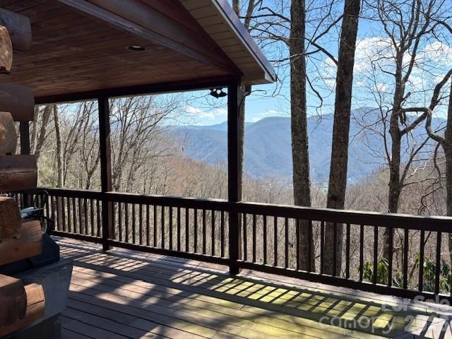 399 Bent Tree Road Maggie Valley, NC 28751 - Photo 3 of 48 a view of balcony with wooden floor