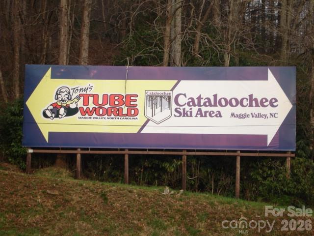 399 Bent Tree Road Maggie Valley, NC 28751 - Photo 45 of 48 a sign on the wall of the house