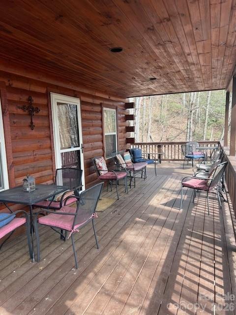 399 Bent Tree Road Maggie Valley, NC 28751 - Photo 6 of 48 a living room with furniture and a wooden floor
