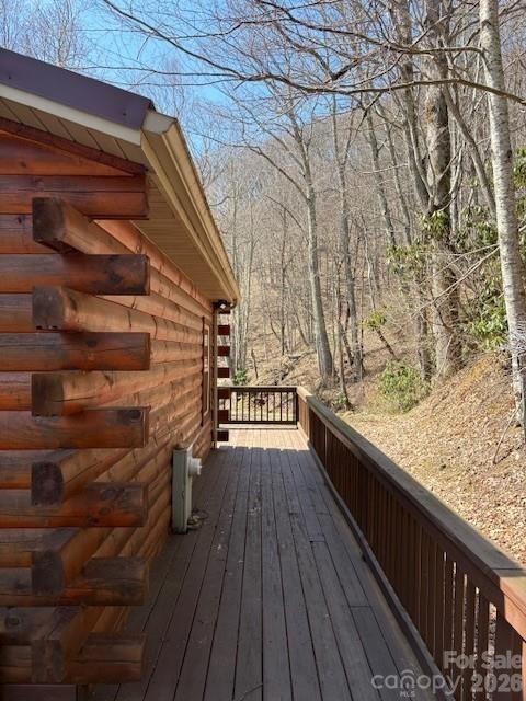 399 Bent Tree Road Maggie Valley, NC 28751 - Photo 10 of 48 a view of balcony with wooden floor and fence