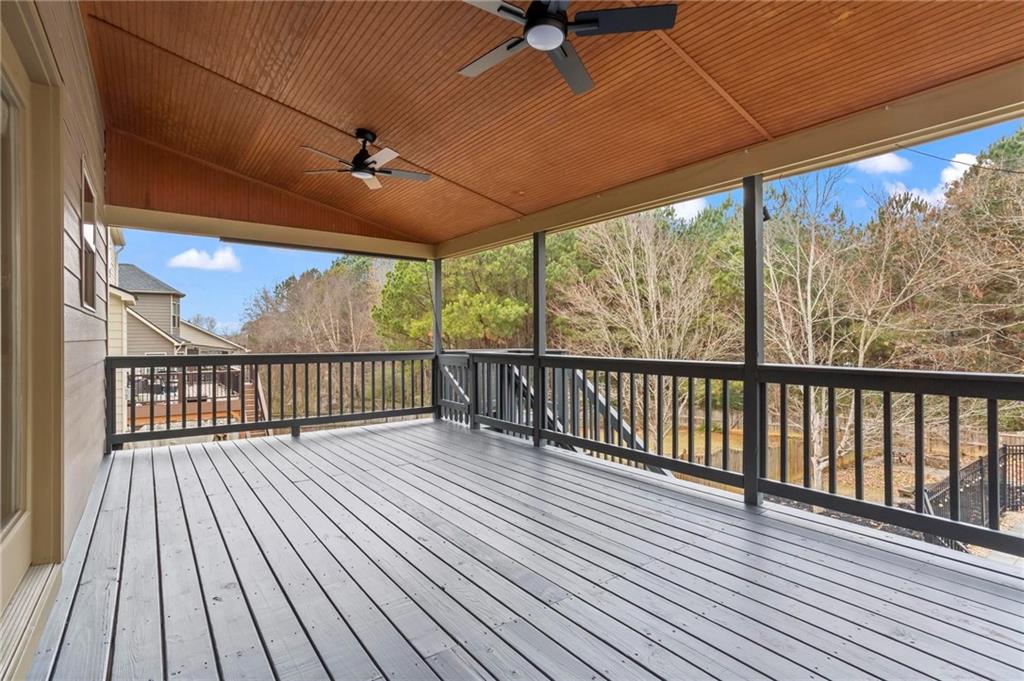 506 Olympic Way Acworth, GA 30102 - Photo 19 of 73 a view of a balcony with wooden floor