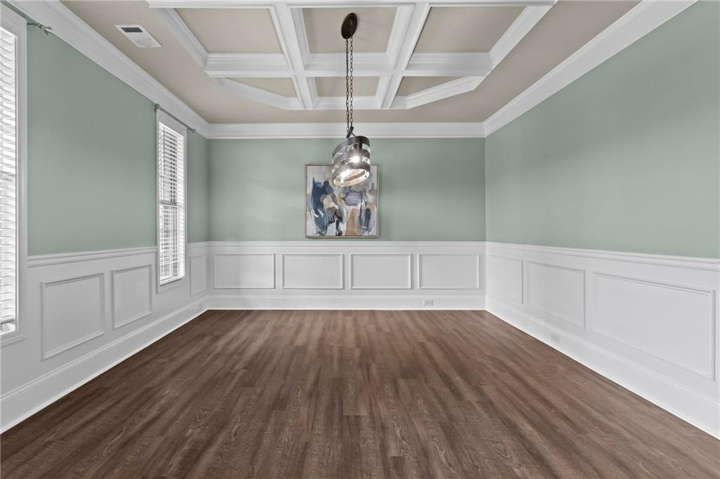 506 Olympic Way Acworth, GA 30102 - Photo 22 of 73 a view of a room with wooden floors and chandelier