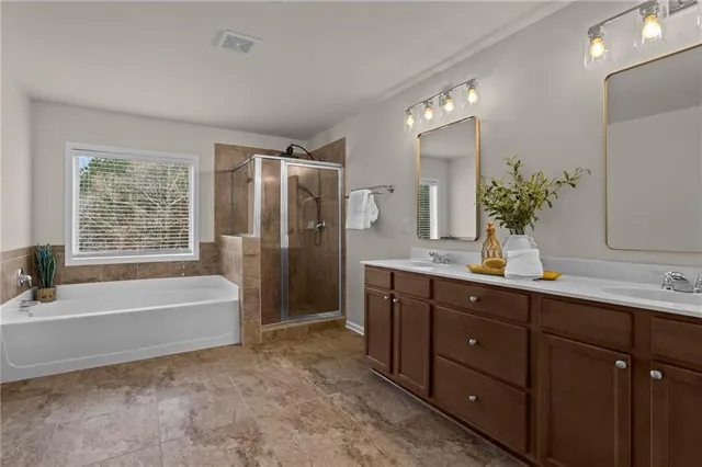 a bathroom with a toilet a sink and a mirror