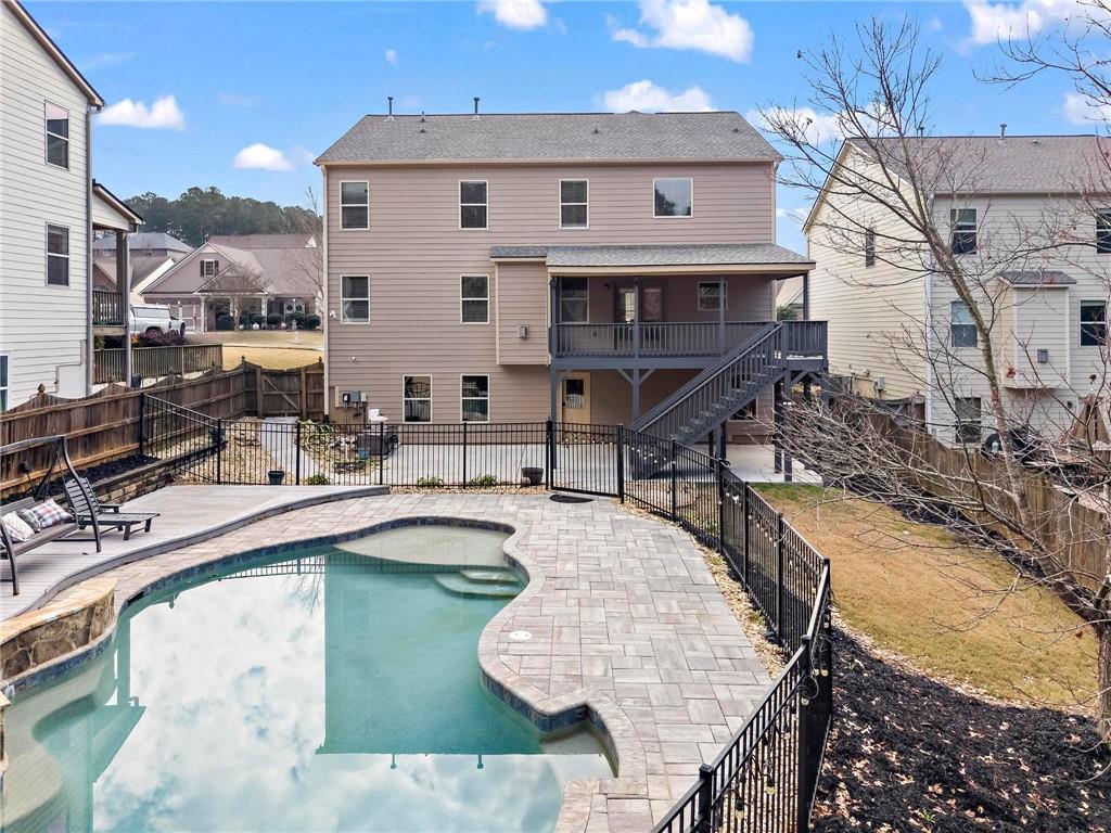 506 Olympic Way Acworth, GA 30102 - Photo 56 of 73 a view of a house with pool and sitting area