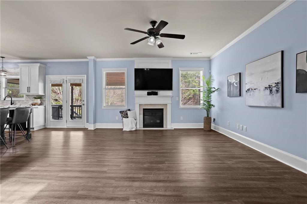 506 Olympic Way Acworth, GA 30102 - Photo 10 of 73 a living room with furniture fireplace and flat screen tv
