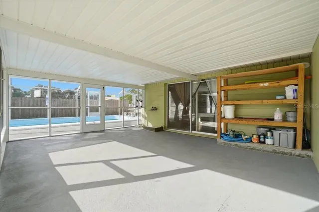 a view of an empty room with a sliding door