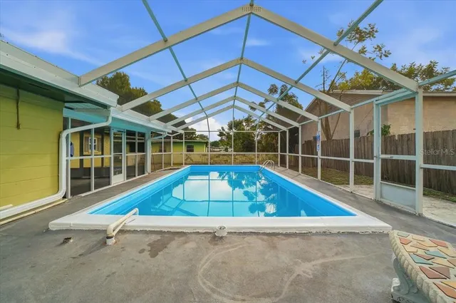 a view of a balcony with wooden floor
