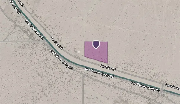 a sign board with a snow on the road