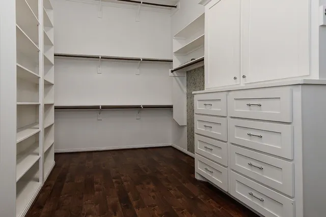 a view of an empty walk in closet