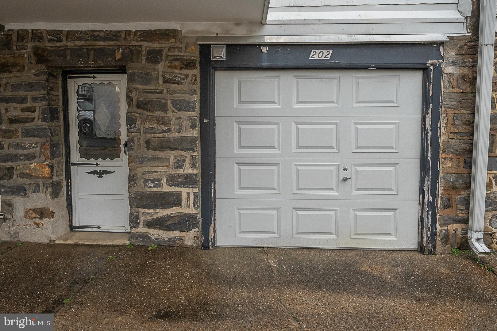 202 Kent Road Upper Darby, PA 19082 - Photo 26 of 27 Back door and garage
