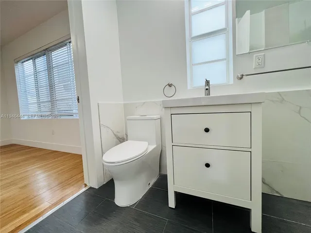 a bathroom with a sink and a toilet