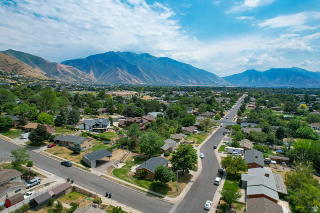 120 North 1230 E Street Springville, UT 84663 - Photo 49 of 60 Expansive mountain backdrop framing a residential area with mature trees and established streets