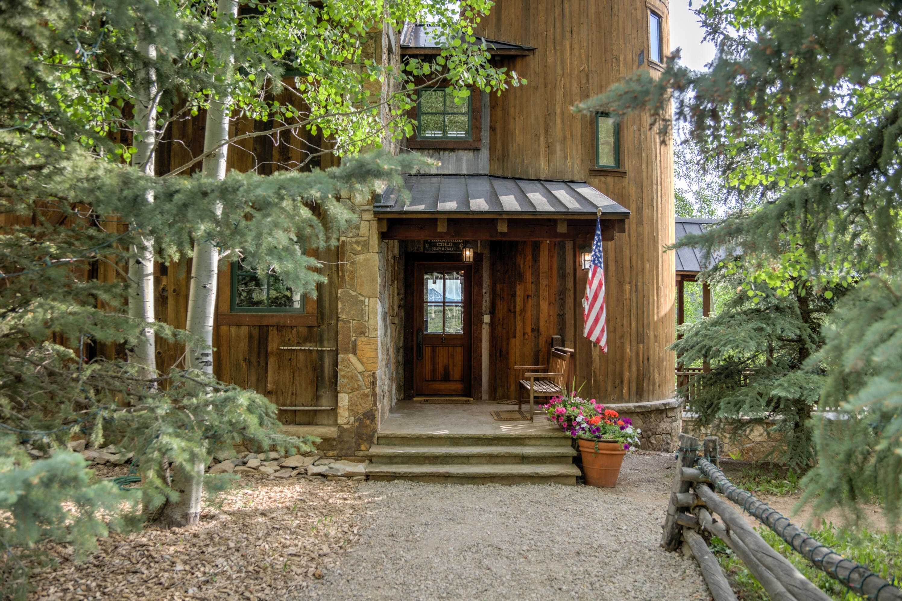6131 Last Dollar Road Telluride, CO 81435 - Photo 14 of 86 front view of a house with a porch