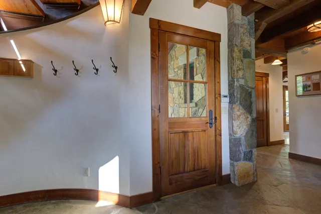 a view of a backyard with sitting area