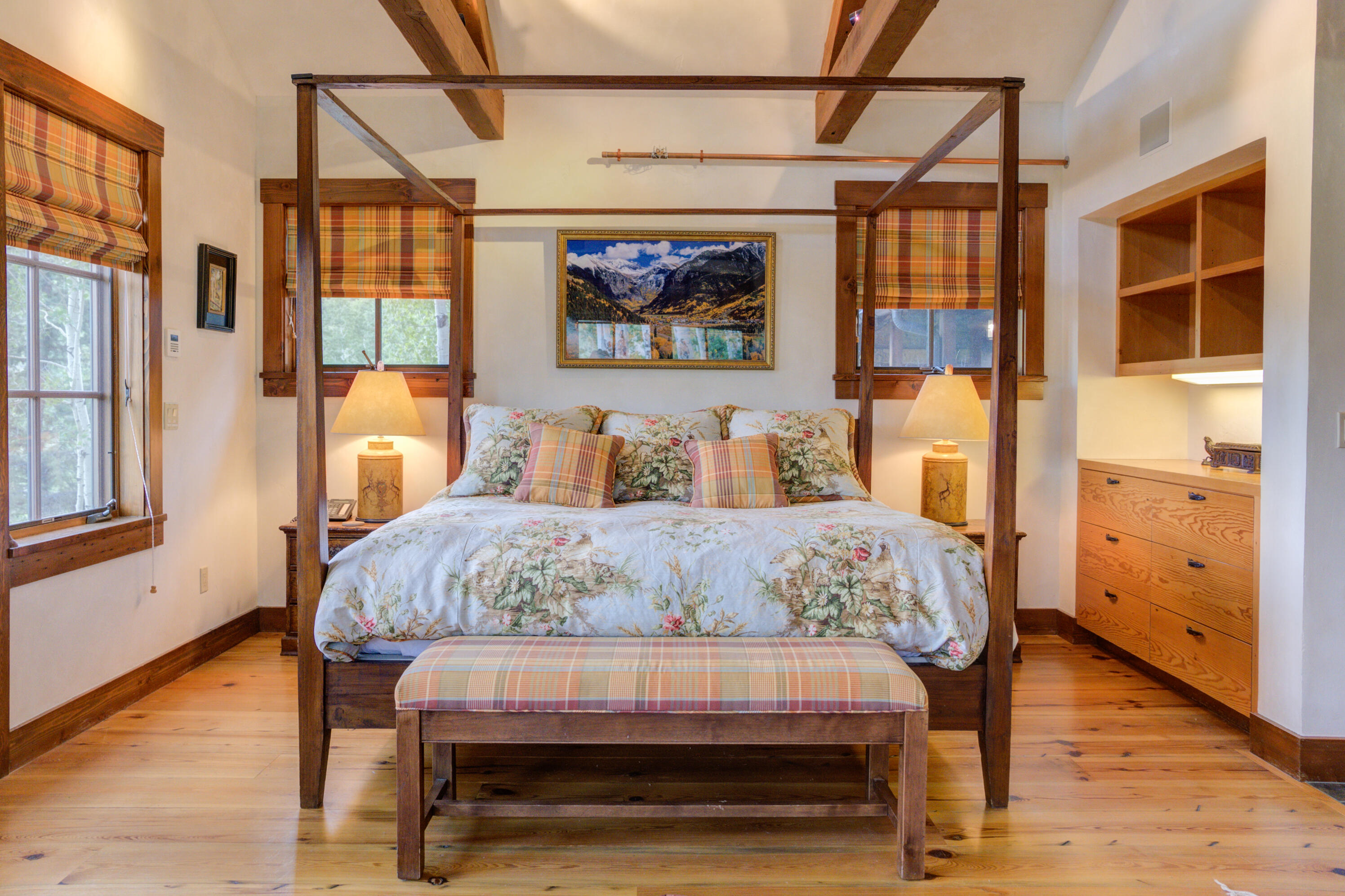 6131 Last Dollar Road Telluride, CO 81435 - Photo 39 of 86 a bedroom with a bed and wooden floor