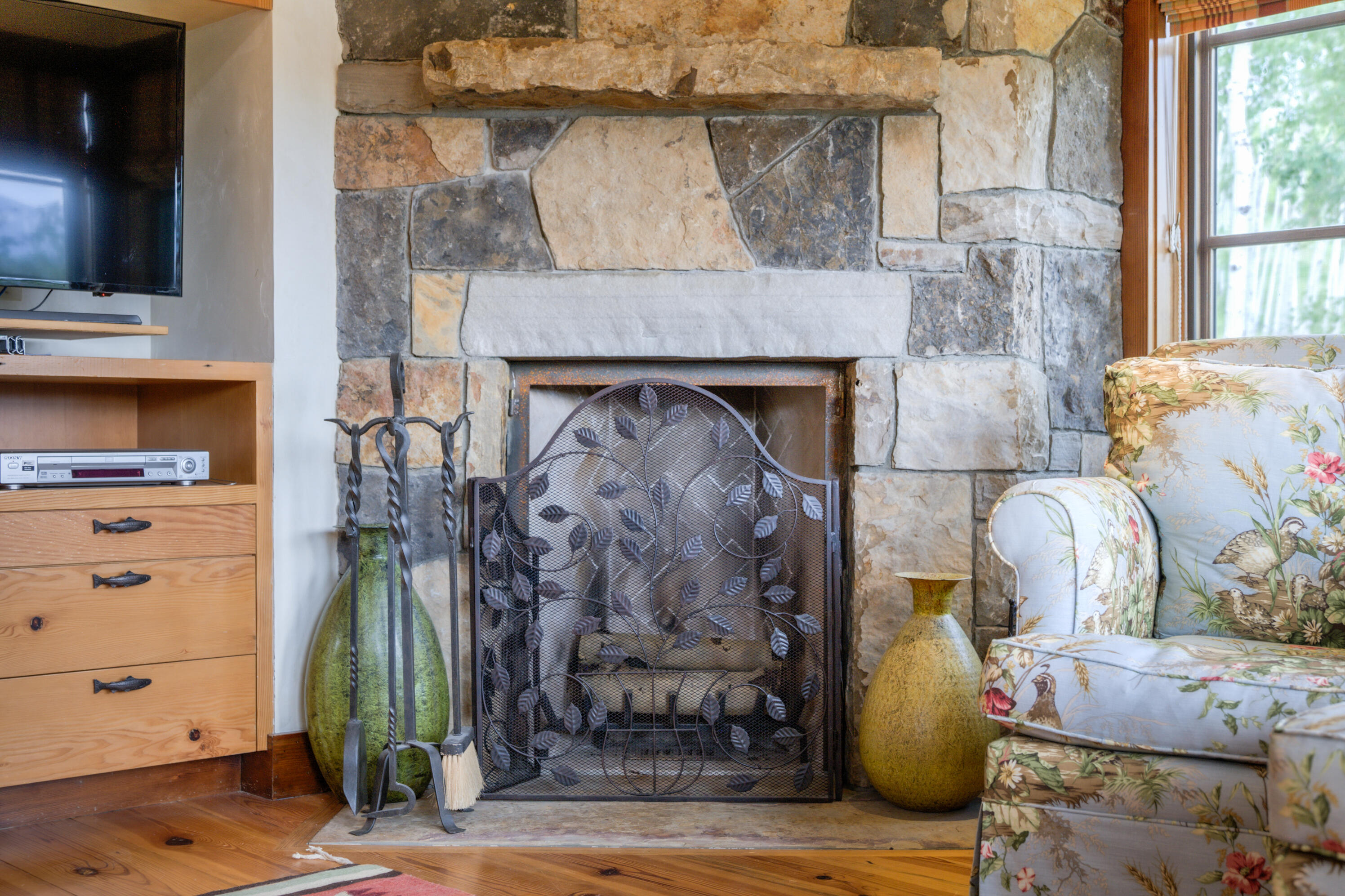 6131 Last Dollar Road Telluride, CO 81435 - Photo 40 of 86 a living room with furniture and a fireplace