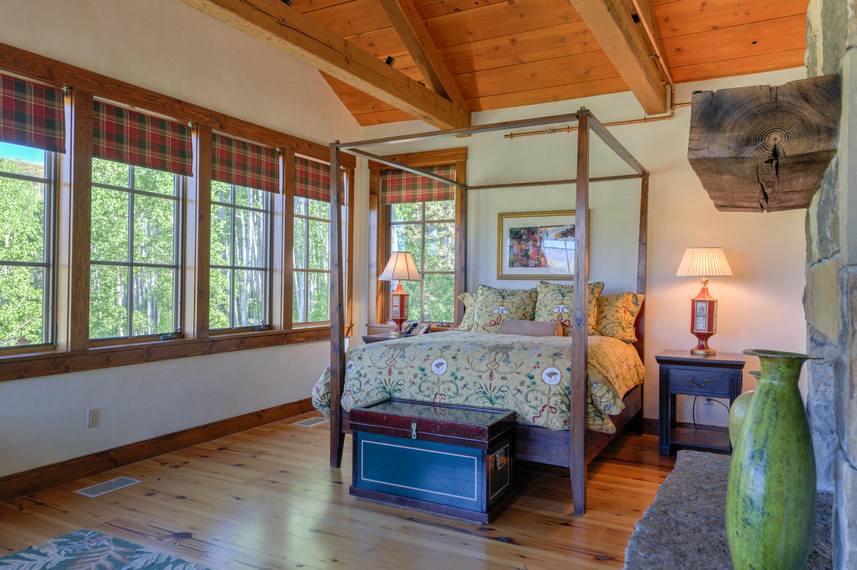 6131 Last Dollar Road Telluride, CO 81435 - Photo 52 of 86 a bed sitting in a bedroom next to a window