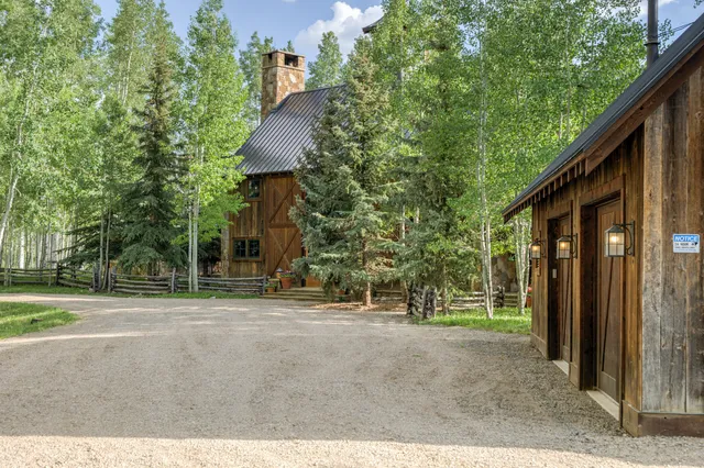 a view of entryway and hall with dining area