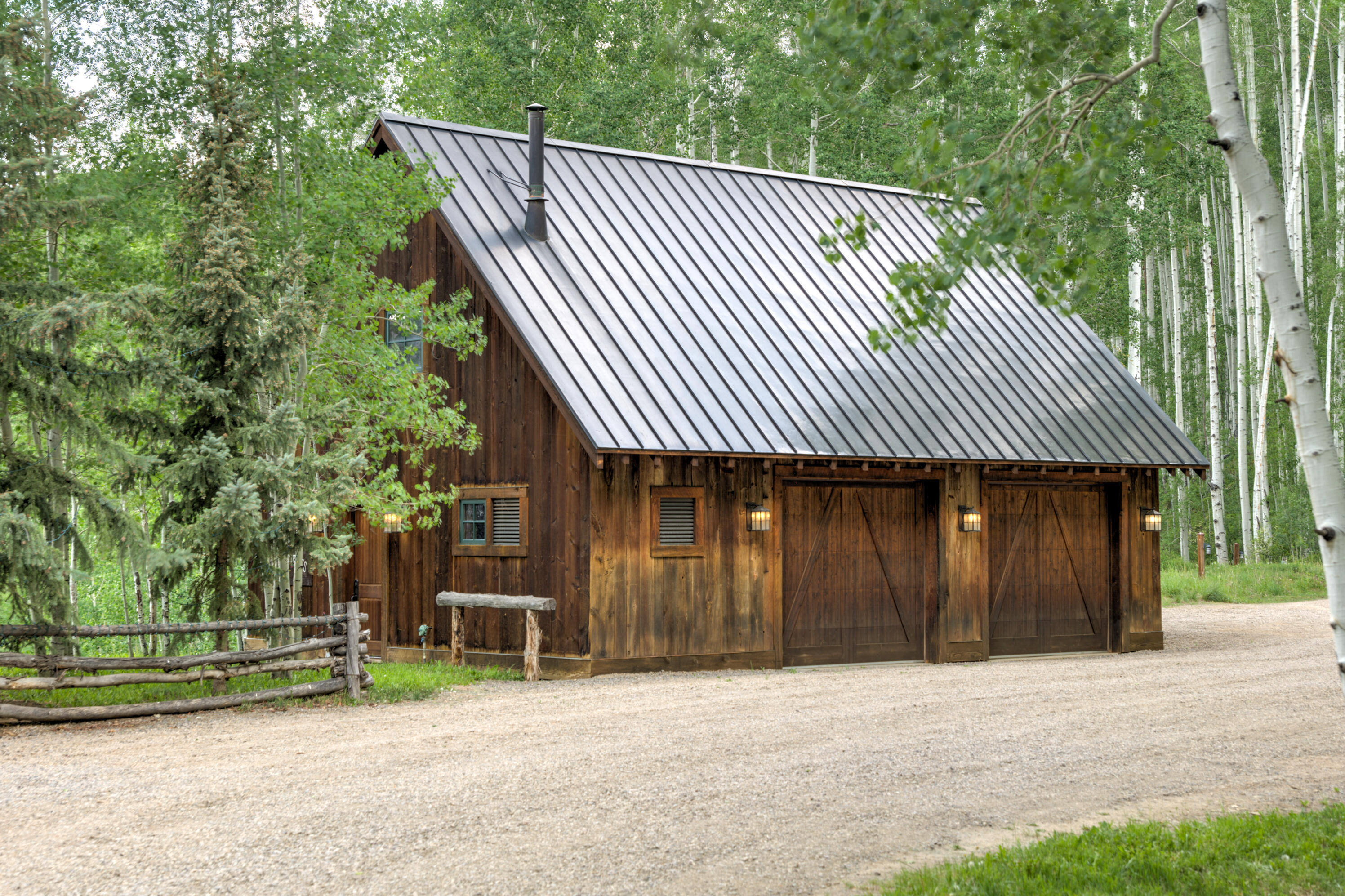 6131 Last Dollar Road Telluride, CO 81435 - Photo 9 of 86 a front view of a house having yard