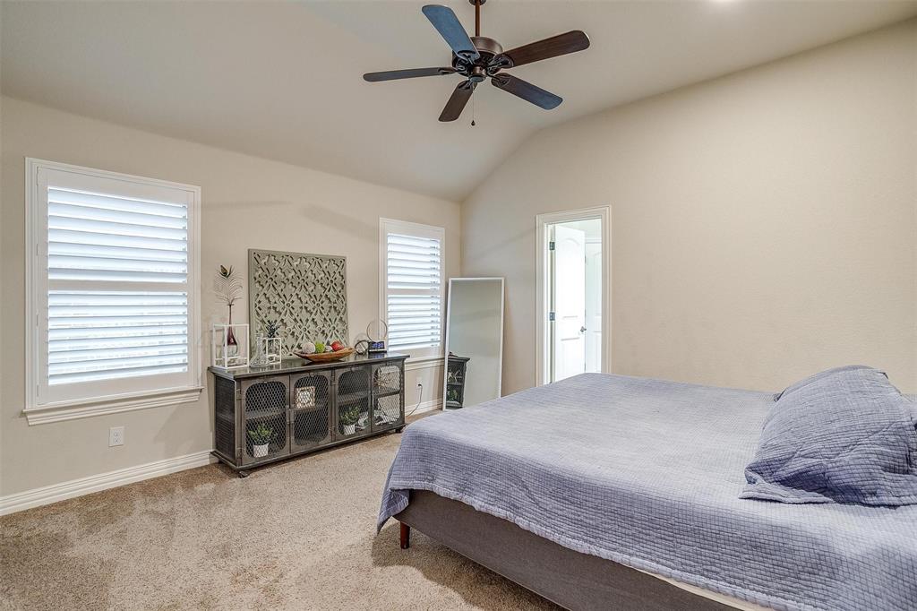 505 N Avenue East Springtown, TX 76082 - Photo 16 of 27 a bedroom with a bed dresser and a window