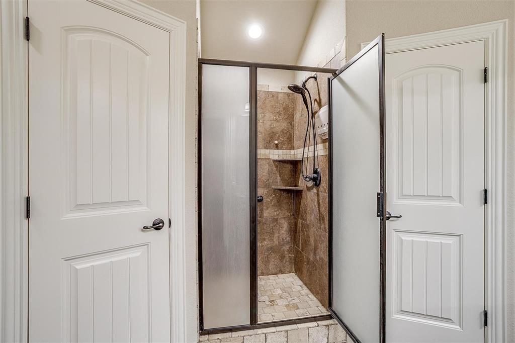 505 N Avenue East Springtown, TX 76082 - Photo 17 of 27 a bathroom with a shower and a sink