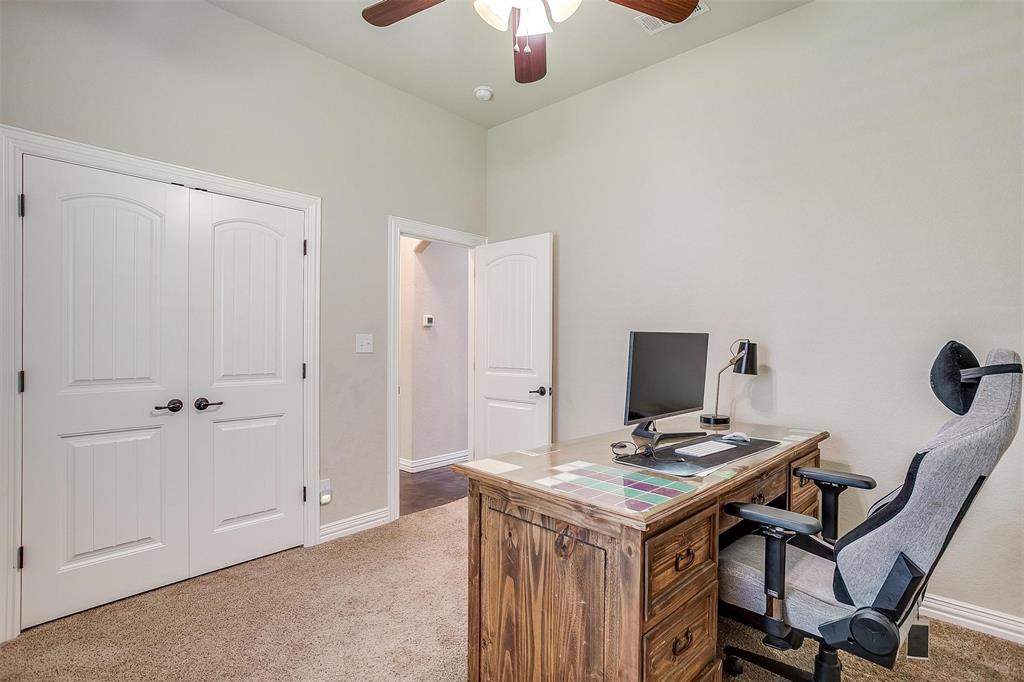 505 N Avenue East Springtown, TX 76082 - Photo 20 of 27 a view of a workspace with furniture