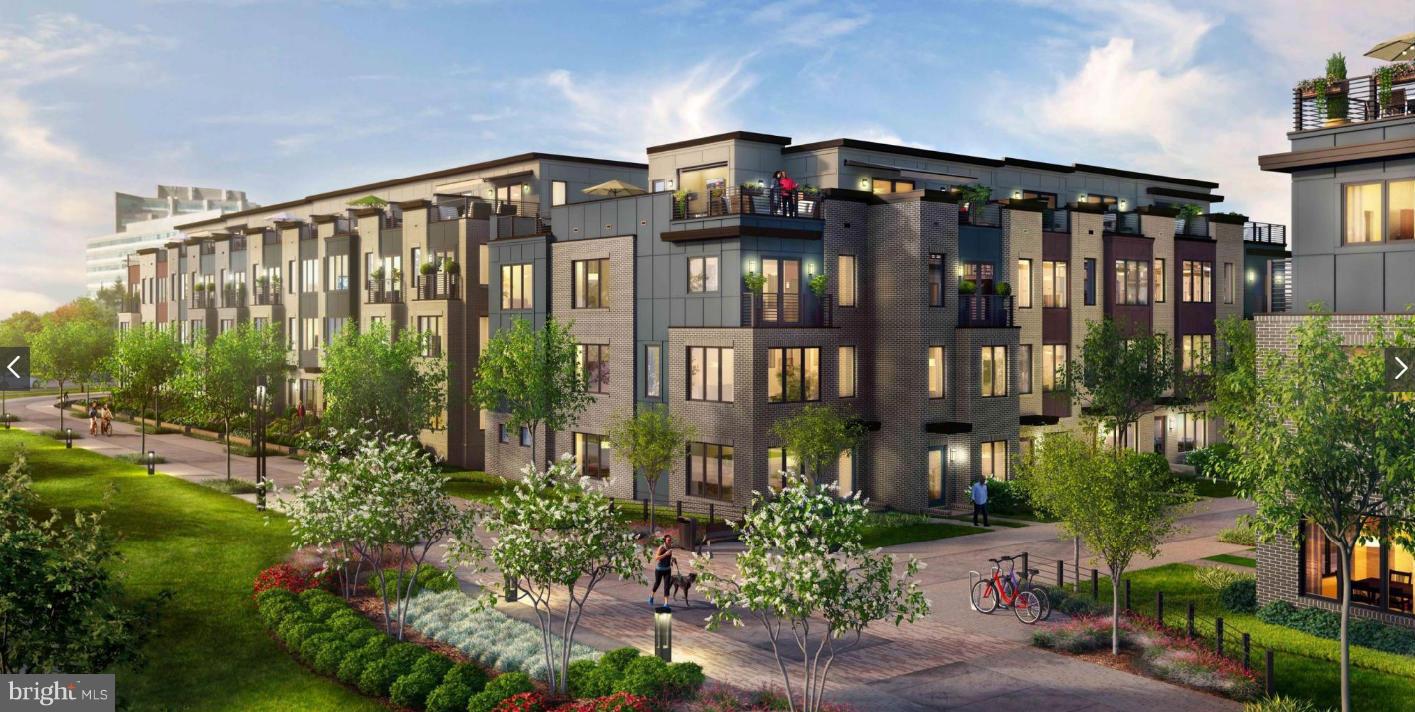 6680 Eames Way Bethesda, MD 20817 - Photo 16 of 19 a front view of a building with garden